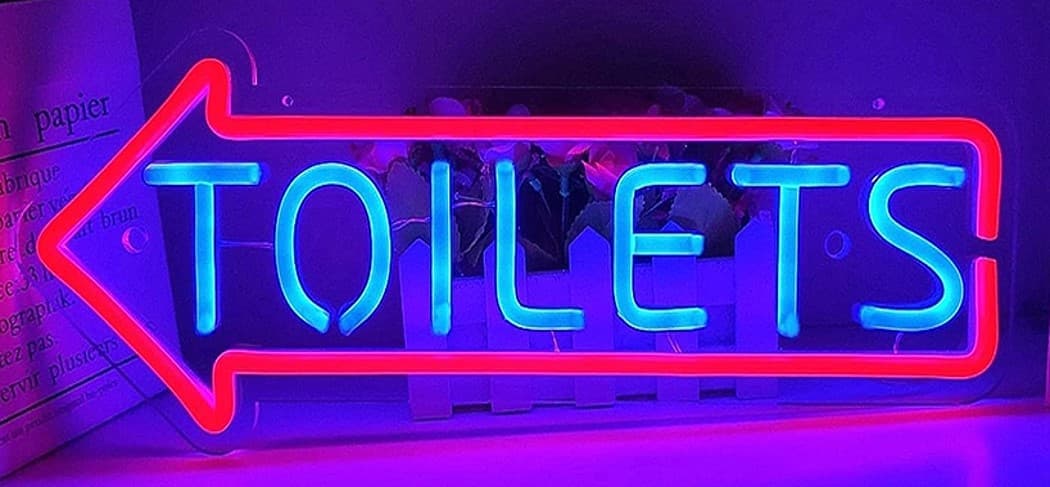 LETRERO TOILETS ELABORADO EN MANGUERA FLEXIBLE NEON EN COLOR ROJO Y AZUL 58X30CM