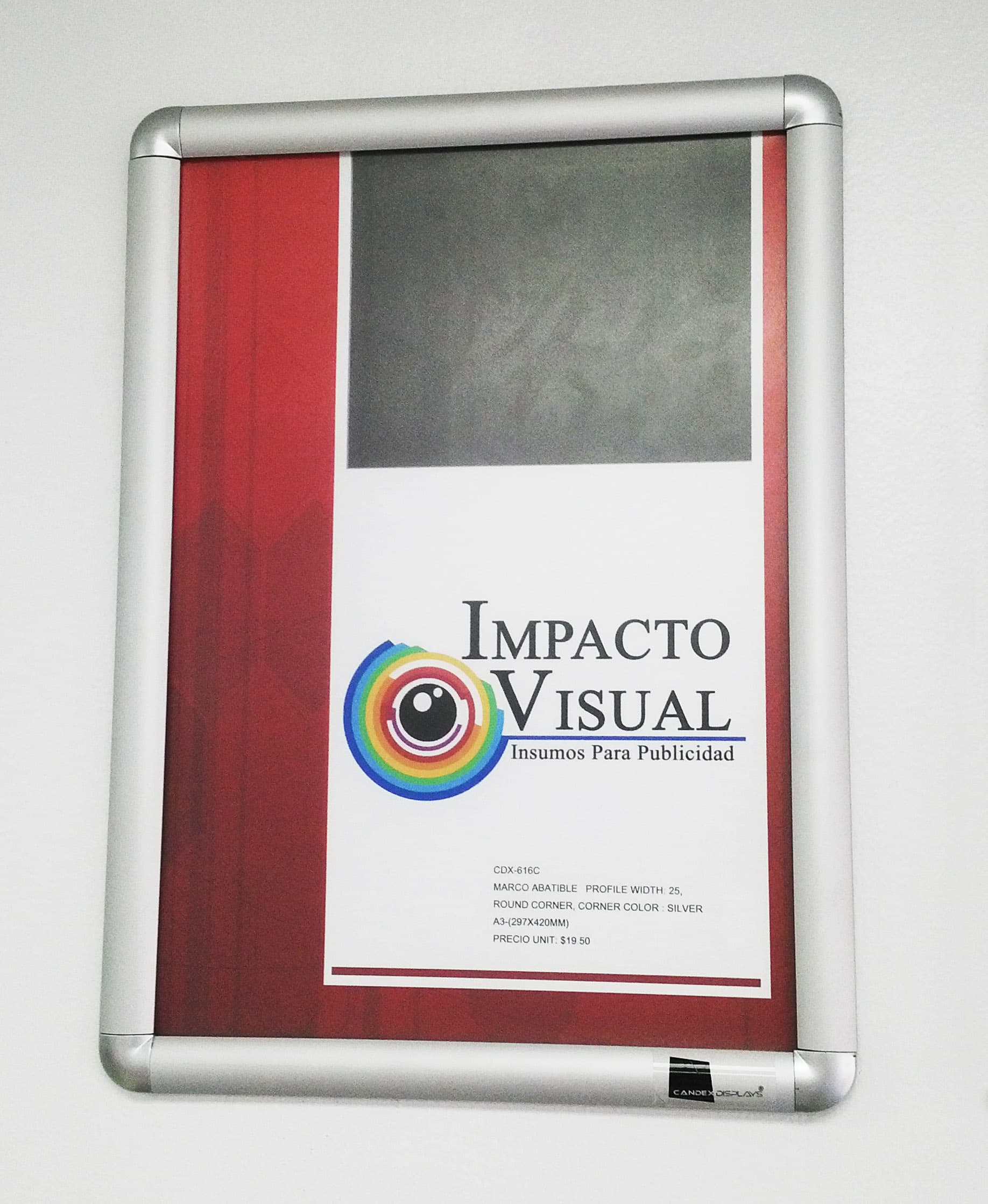 MARCO ABATIBLE PERFIL  DE ALUMINIO 25MM MEDIDA APROXIMADA  B1-707x1000MM ESQUINA CURVA PLATEADA CON PELICULA PROTECTORA EN PVC RIGIDO DE 0.5MM